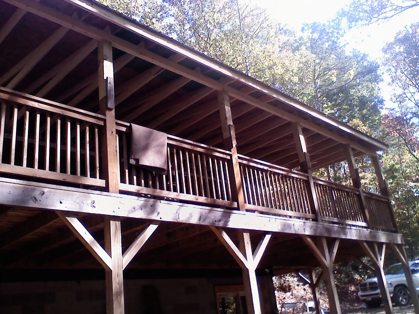 Timber framing under a new elevated porch and deck — Roof Leak Repair in Irving by Roofing Brothers